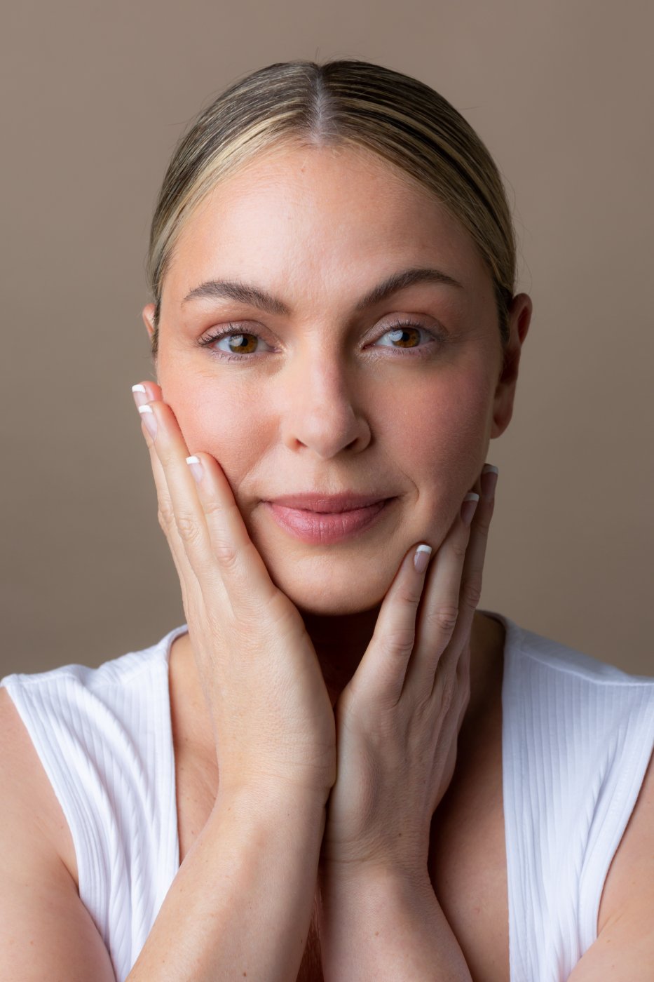 Beauty portrait, hands framing face